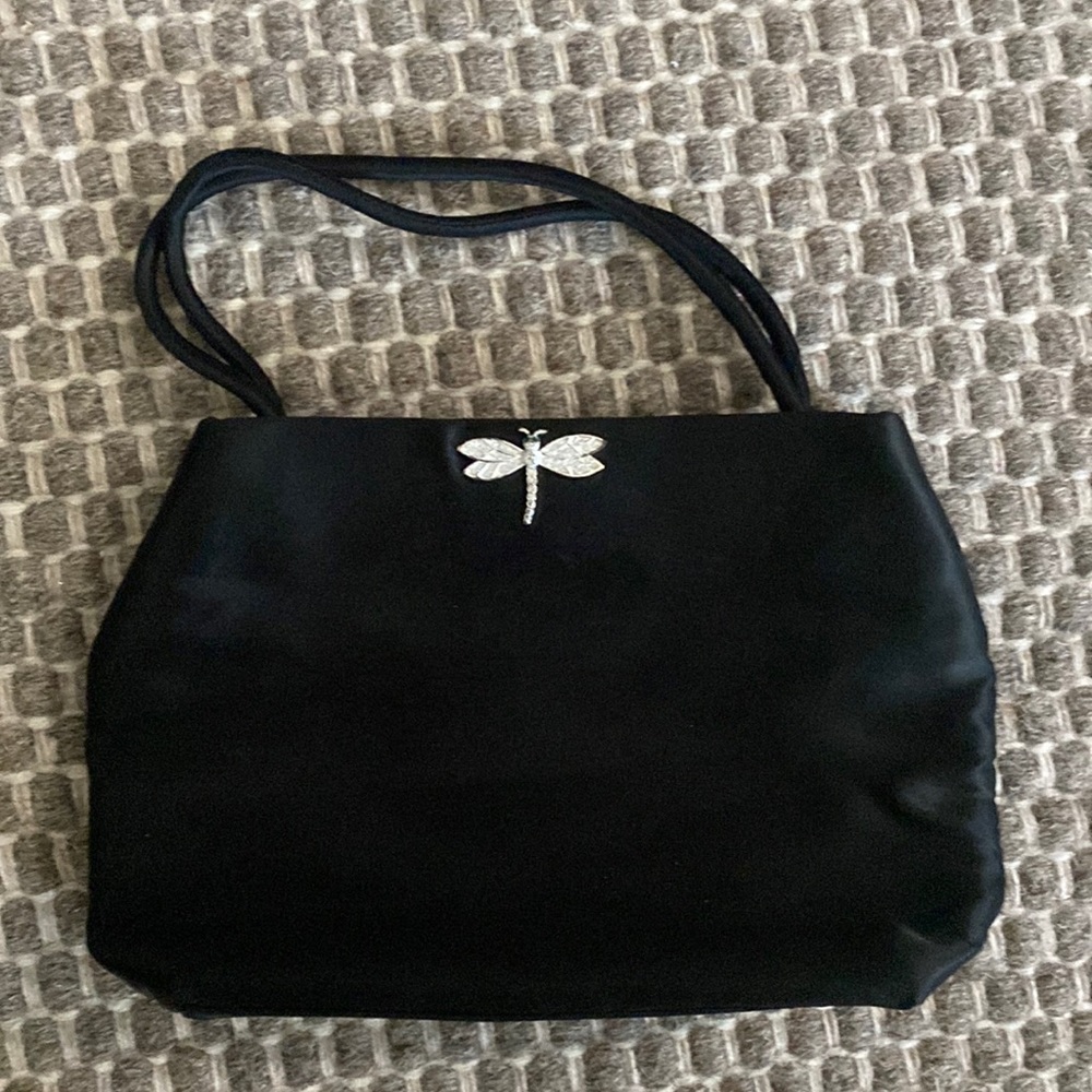 Silky evening bag with magnetic closure